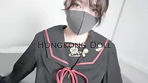 Hong Kong Doll enjoys kinky dog style sex with toys